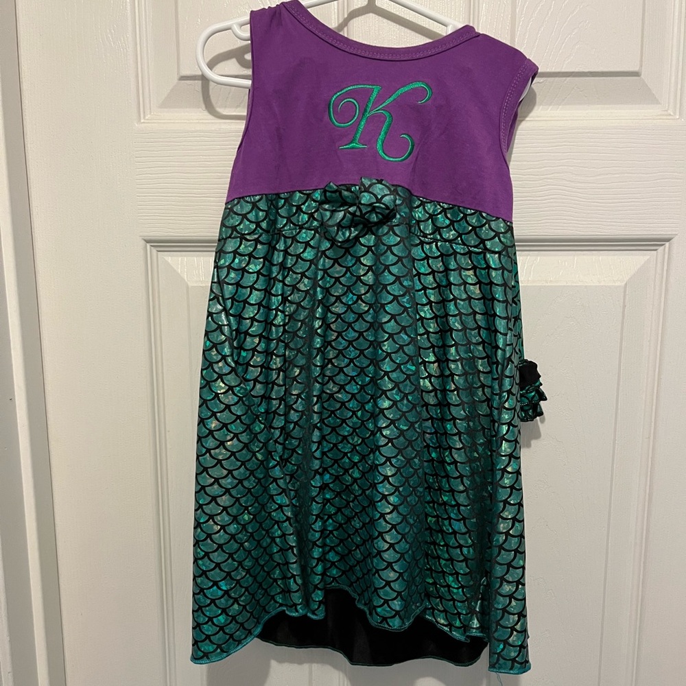 Boutique mermaid outfit with embroidered K